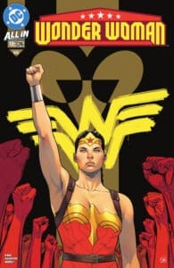 Wonder Woman #26 stands tall with fist raised up