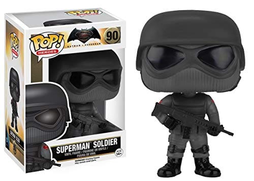 Superman Soldier Funko Pop! figure, a stylized black and gray collectible character holding a gun, displayed next to its packaging.